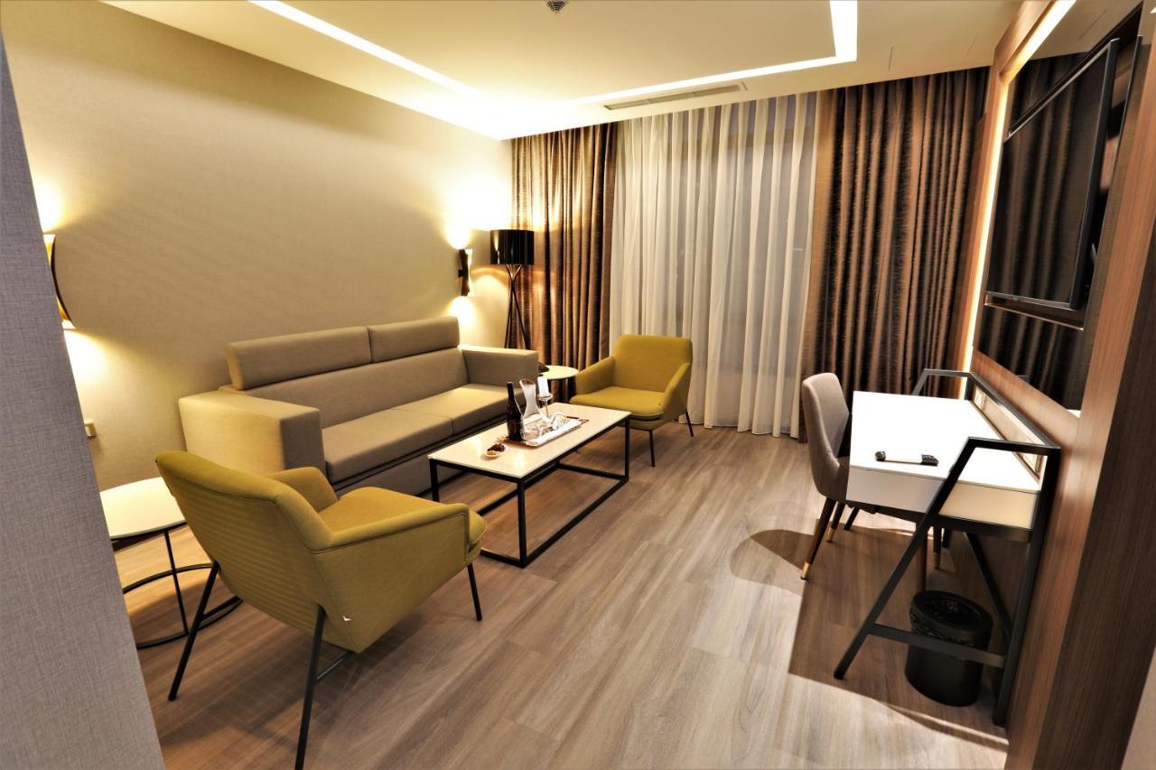 Limak Skopje Luxury Hotel エクステリア 写真 3D rendering of a living room